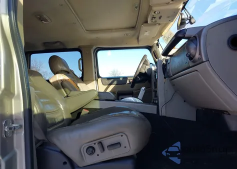 2003 Hummer H2 z USA, uszkodzony, nr VIN 5GRGN23U73H131005